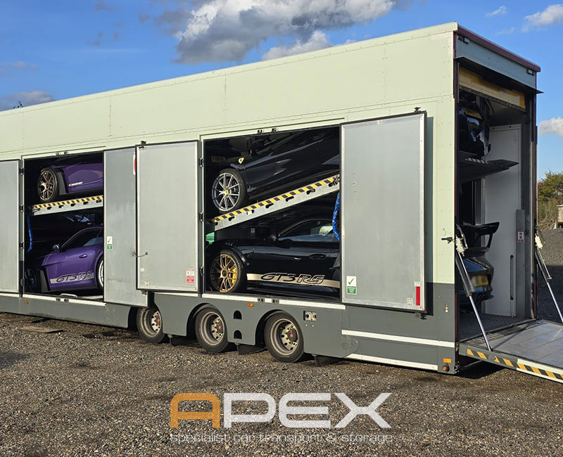 Mutiple Porsche cars trasnported by our specialist trucks